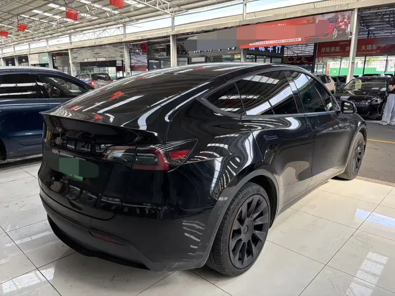 Tesla Model Y — фото 5