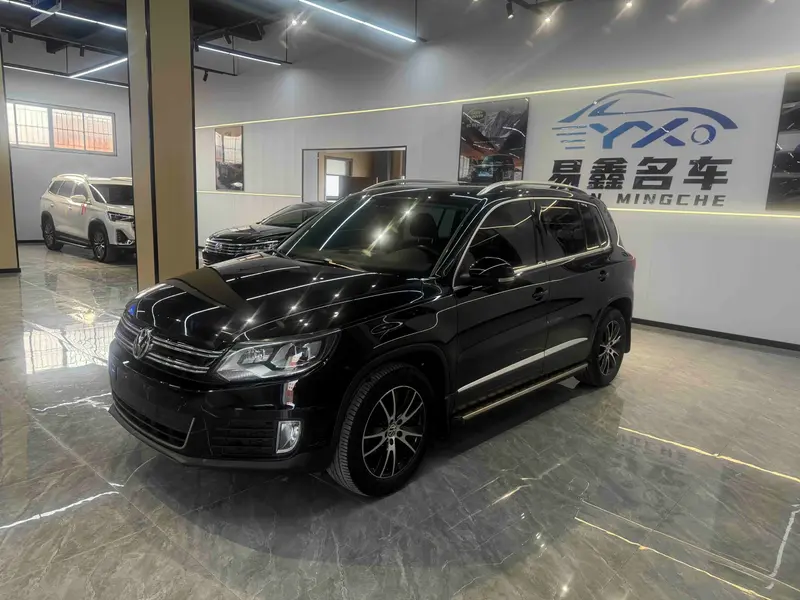 Volkswagen Tiguan — фото 1