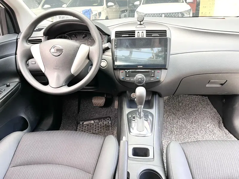 Nissan Tiida — фото 7