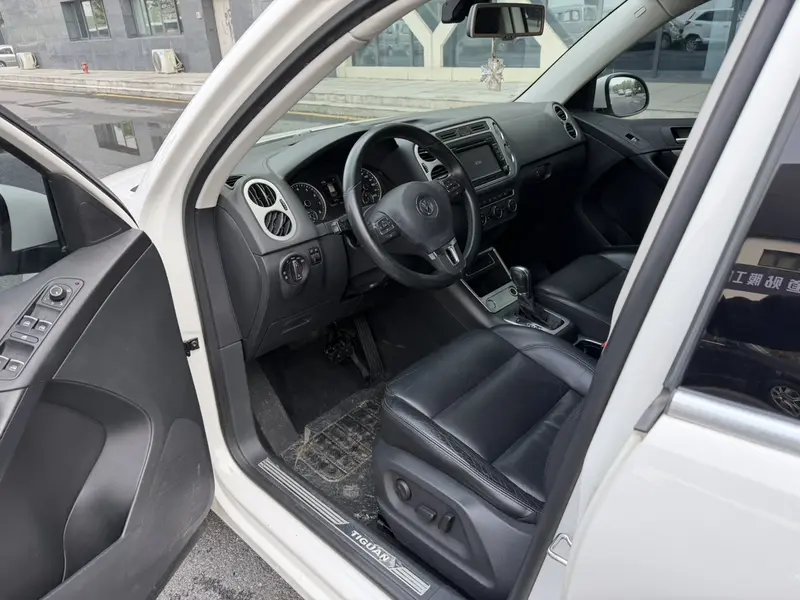 Volkswagen Tiguan — фото 10