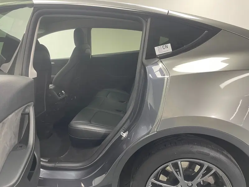 Tesla Model Y — фото 18