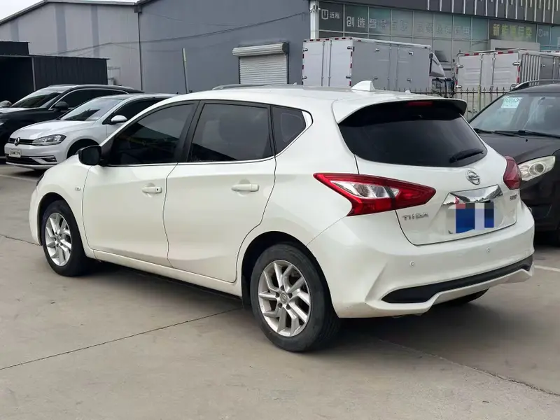 Nissan Tiida — фото 2