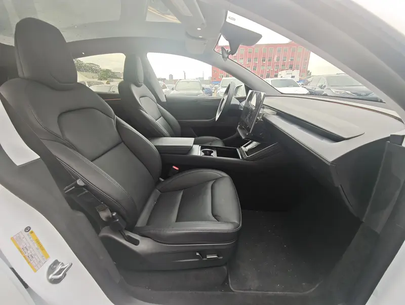 Tesla Model Y — фото 12
